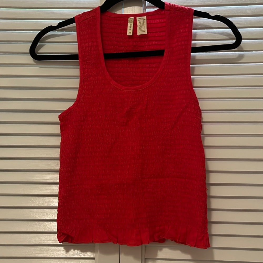 Red sleeveless top!